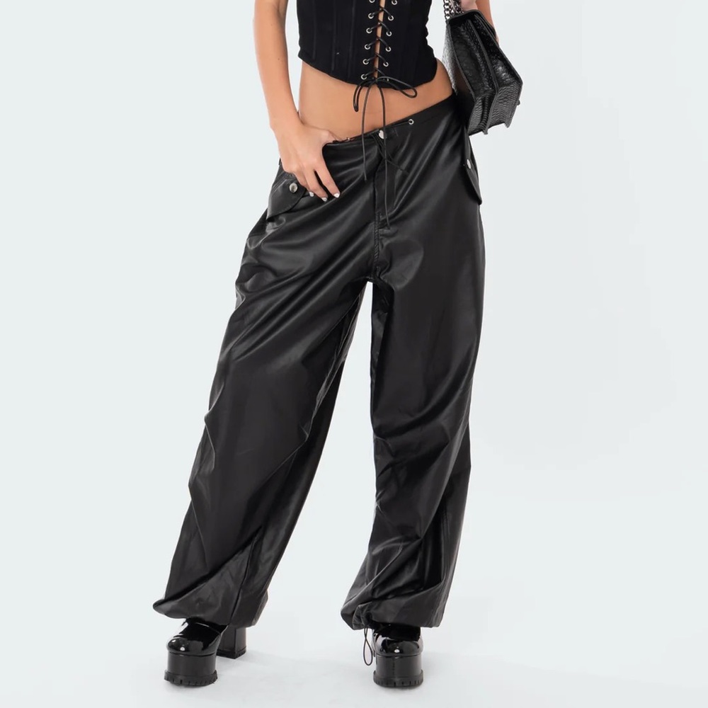 Black faux leather parachute pants